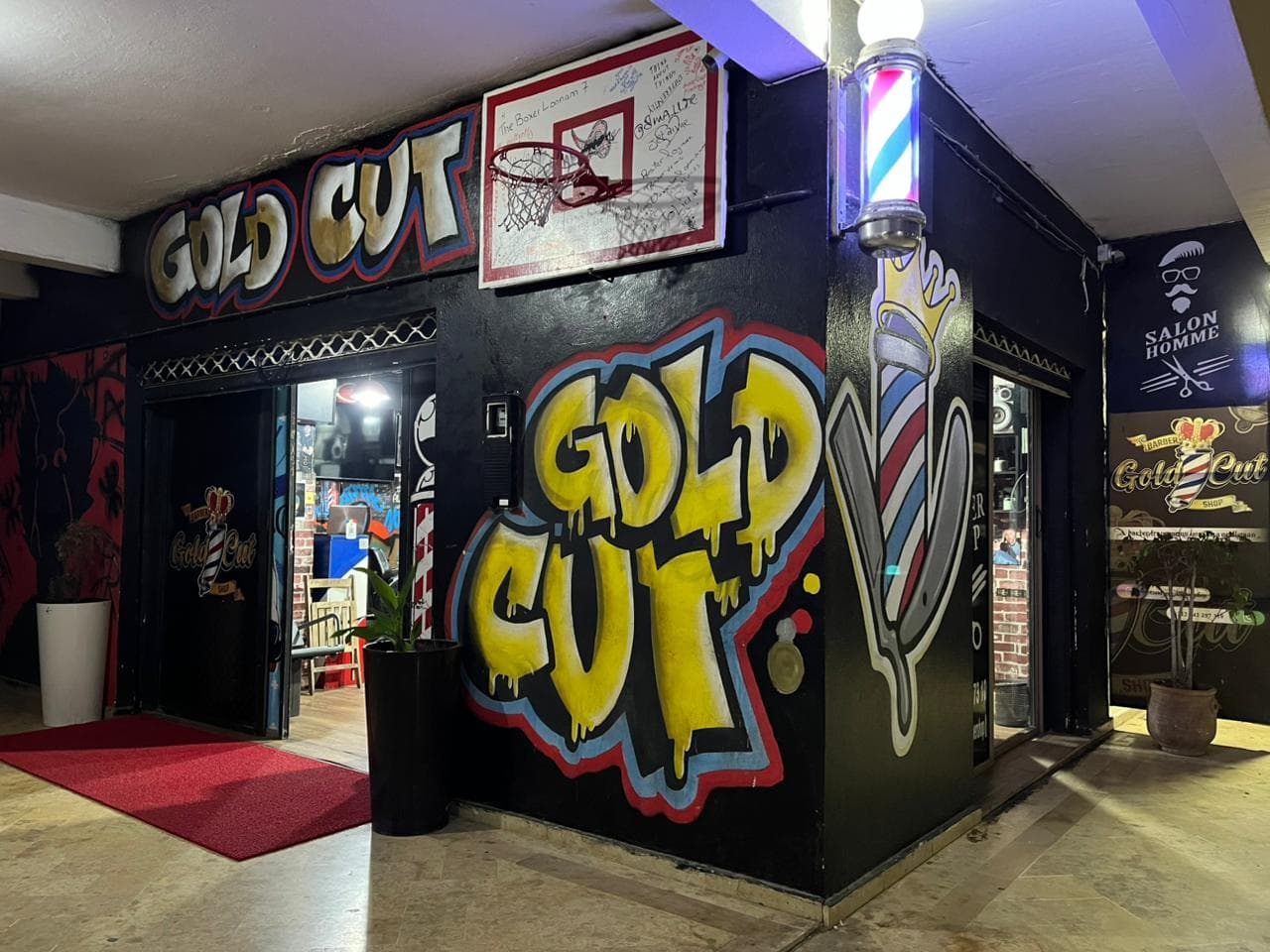 Goldcut Barbershop night exterior photo